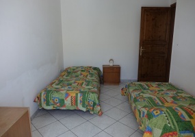 nella foto vediamo na camera da letto di un appartamento in vendita in pescoluse di salve proposto in vendita da petracca immobiliare